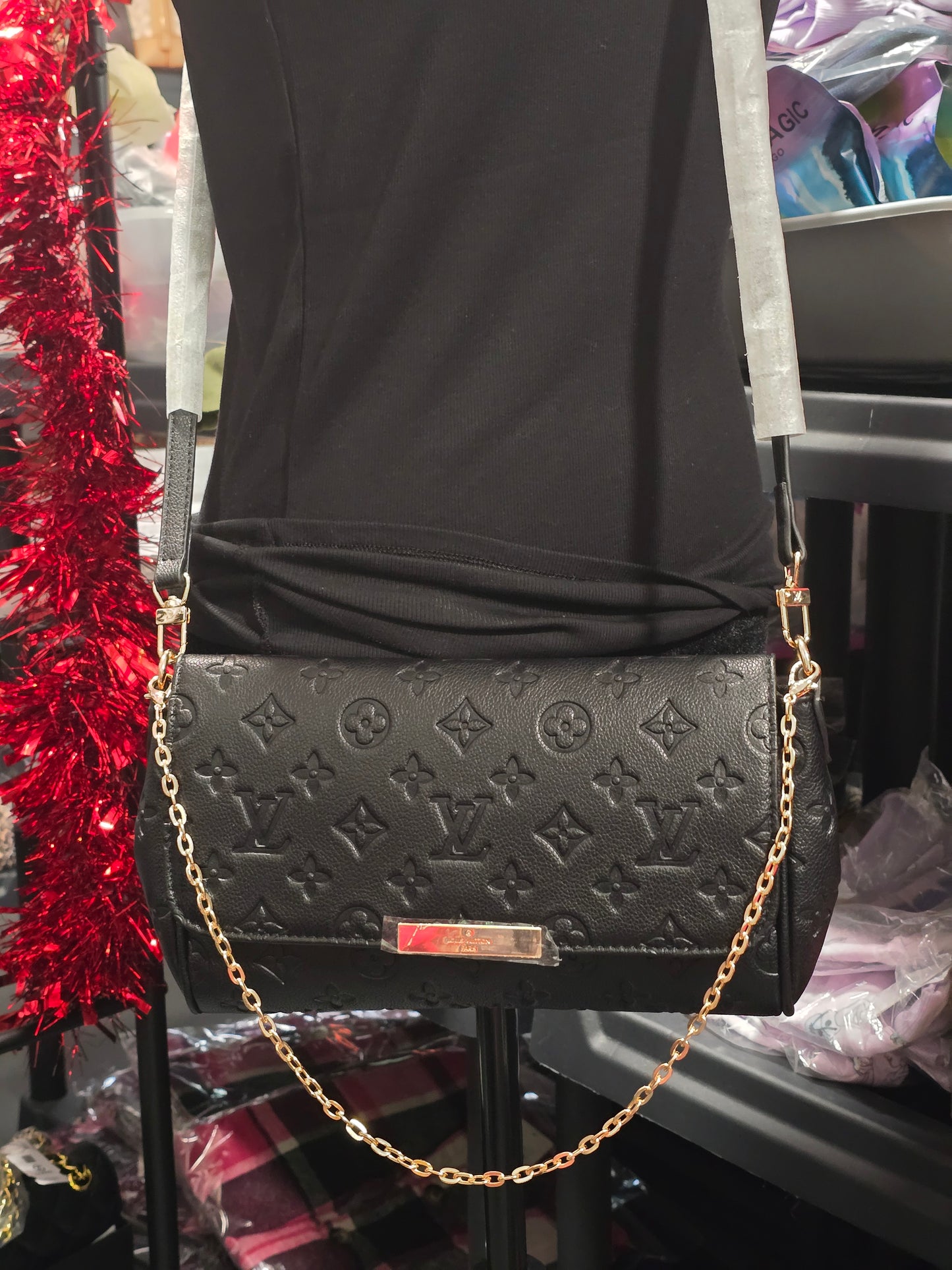 Black Embossed Crossbodies/Handbags