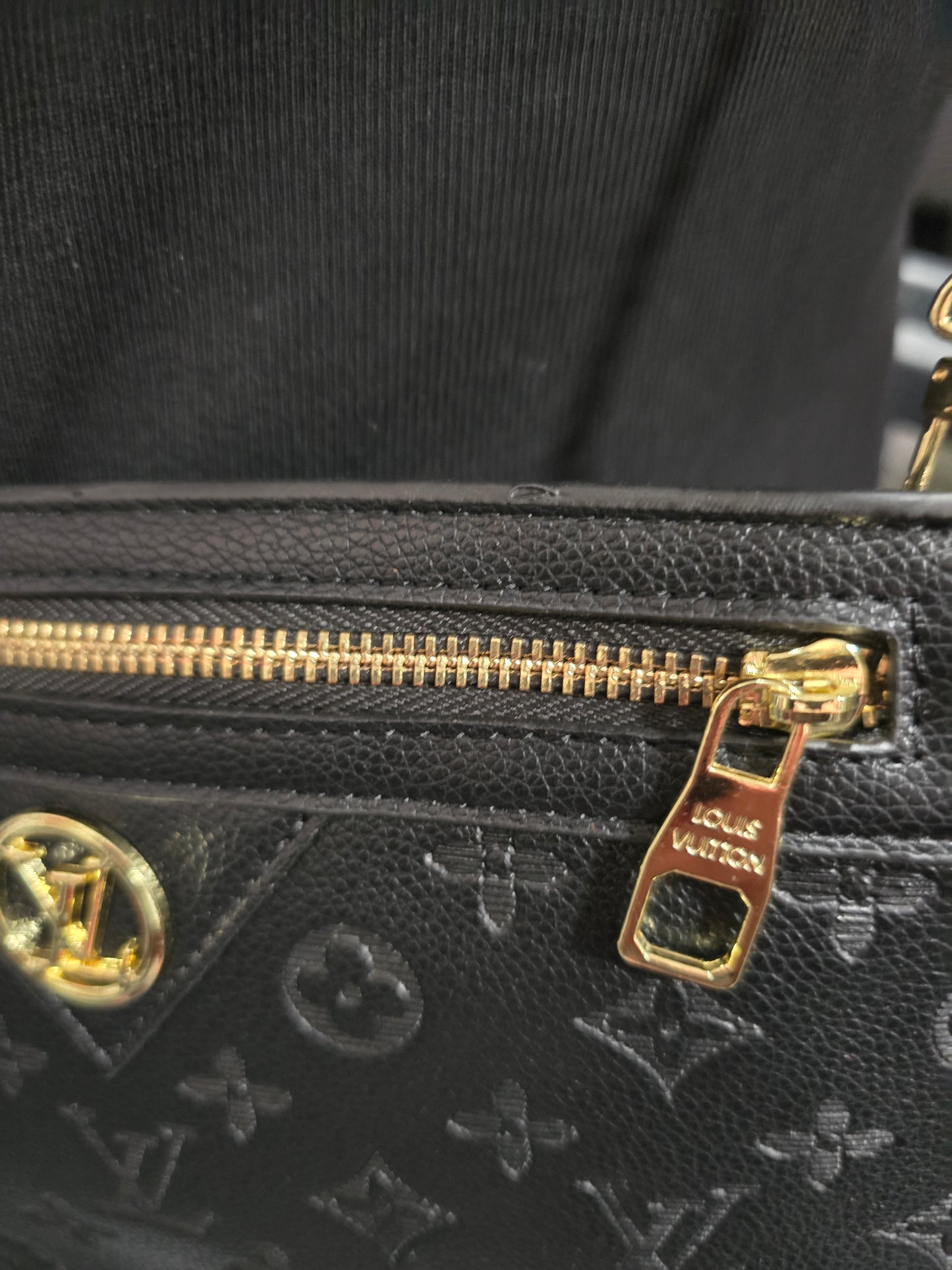 Black Embossed Crossbodies/Handbags